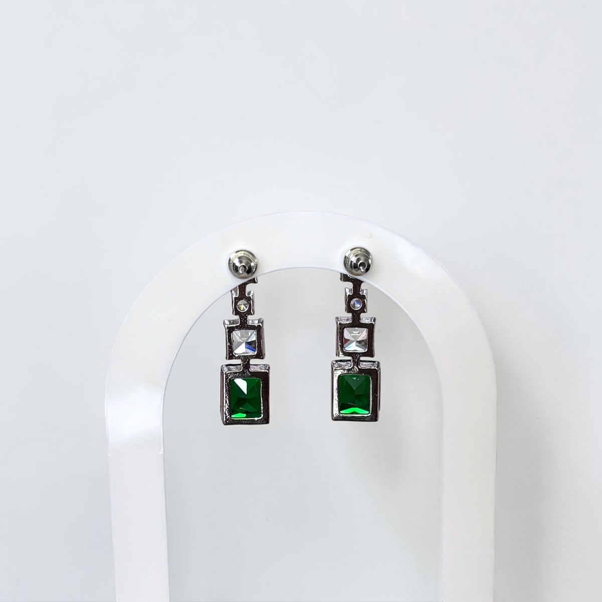 Omayra Boutique emerald green and silver drop earrings featuring square crystals in a lightweight copper setting.