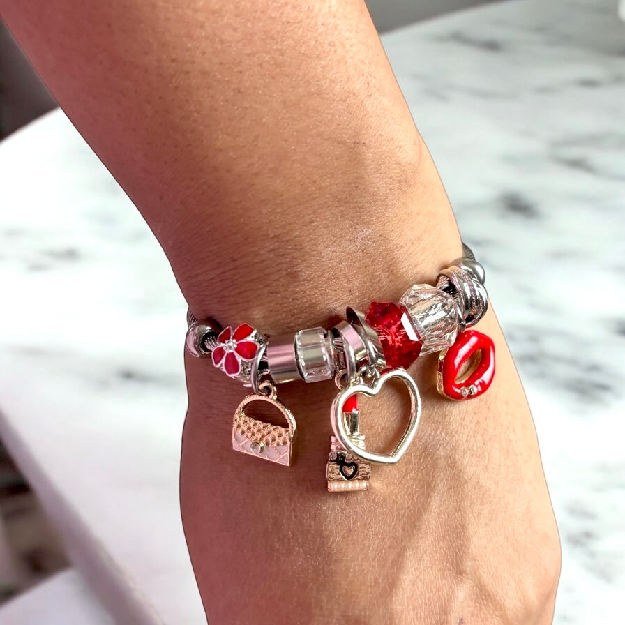 Pulsera de plata con dijes para niña