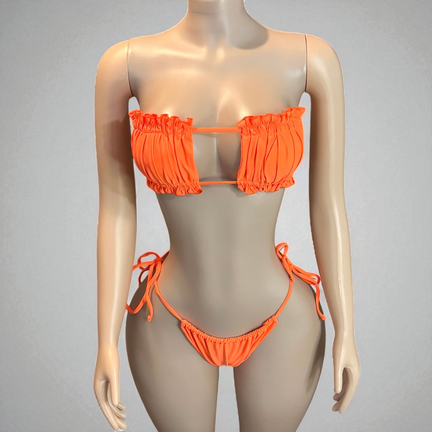 Conjunto de bikini naranja para mujer con conchas