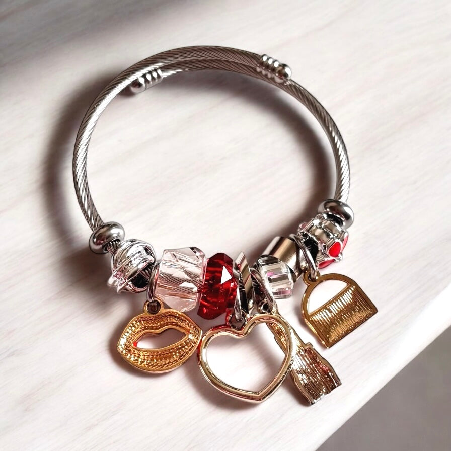Pulsera de plata con dijes para niña