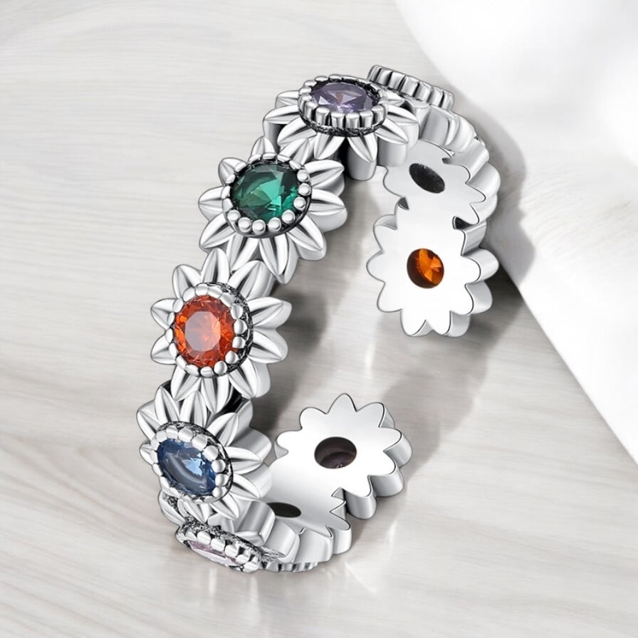 Anillo floral ajustable de colores