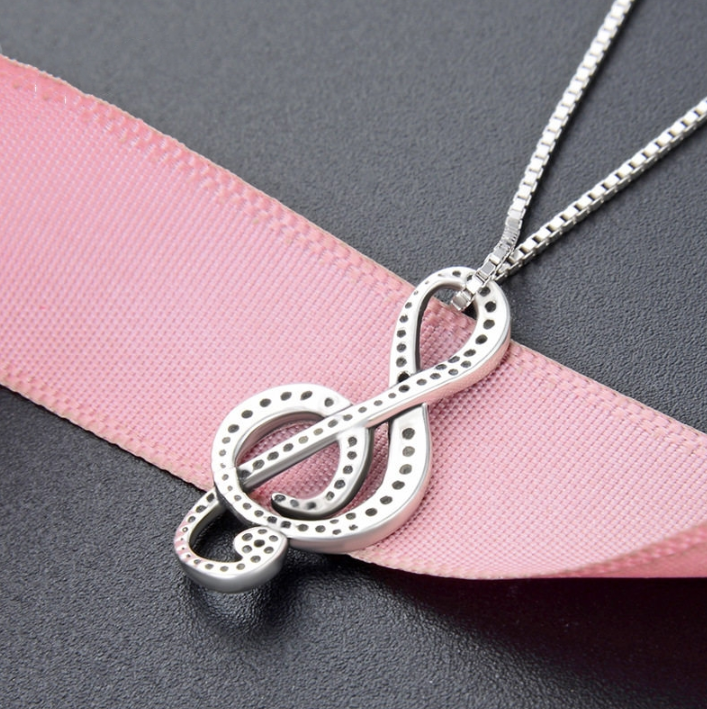 Collar de plata con nota musical