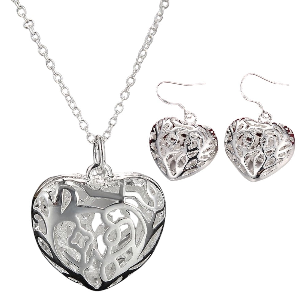 Conjunto elegante de collar y pendientes con forma de corazón
