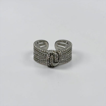 Anillo ajustable de circonitas con nudos cruzados