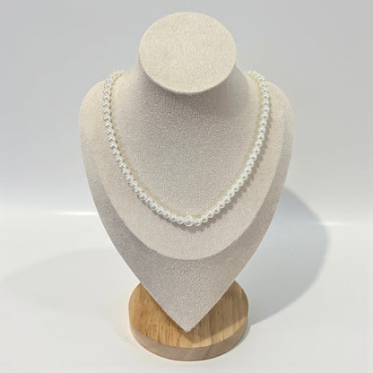 Cadena trasera con borla larga y perlas elegantes