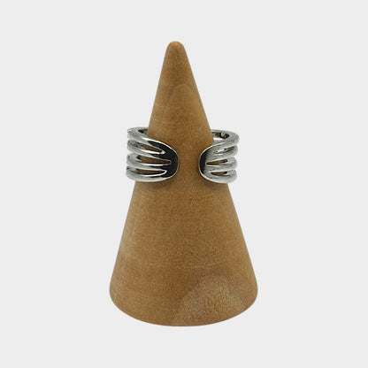Anillo ajustable de circonitas con nudos cruzados