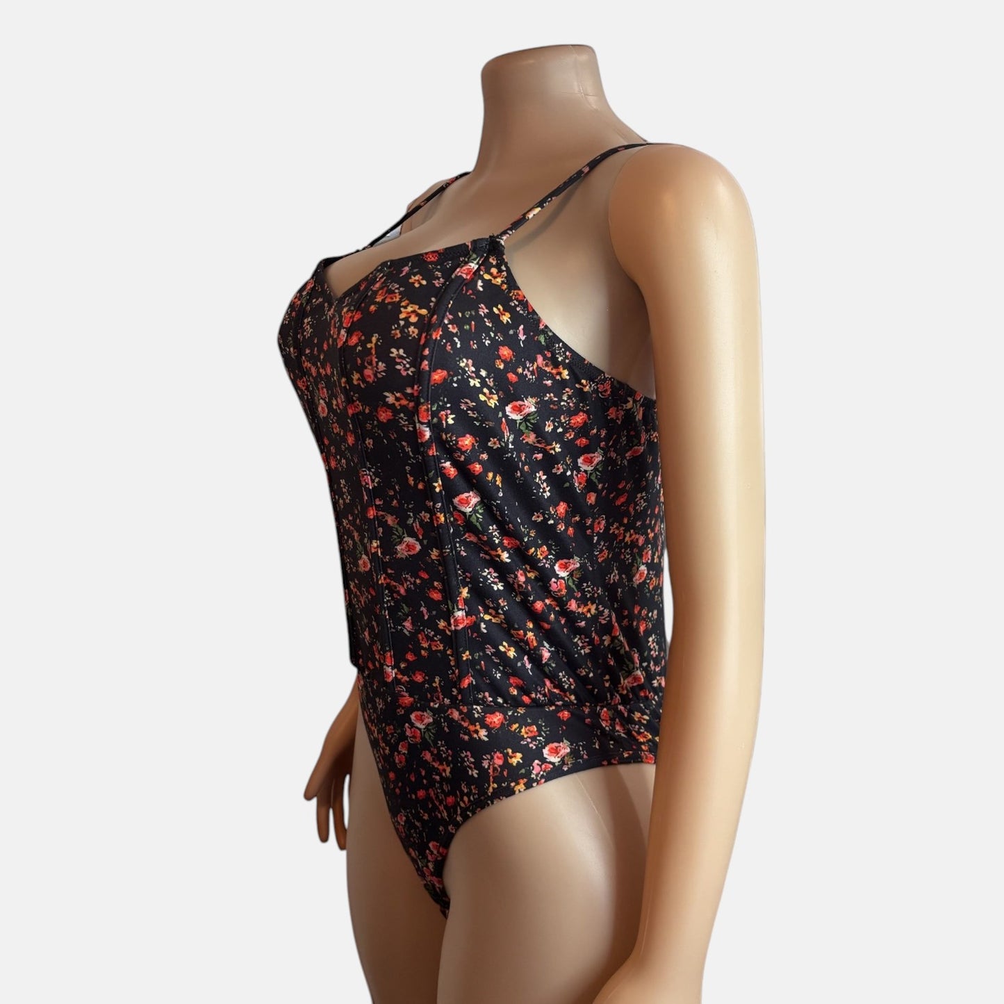 Body de tirantes finos con estampado floral bohemio negro
