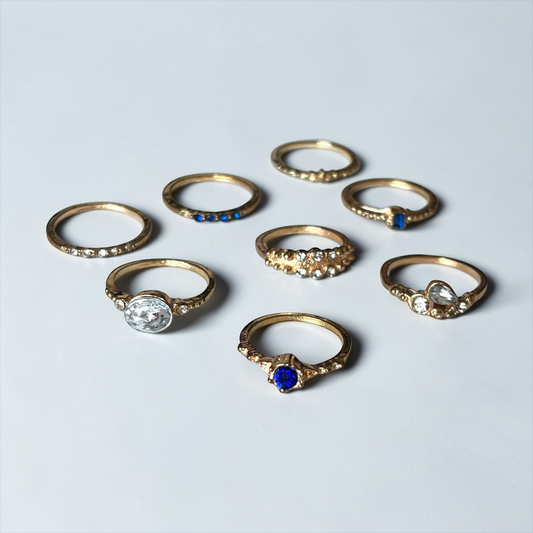 Conjunto de anillos vintage dorados y azules