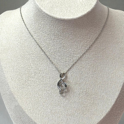 Collar de plata con nota musical