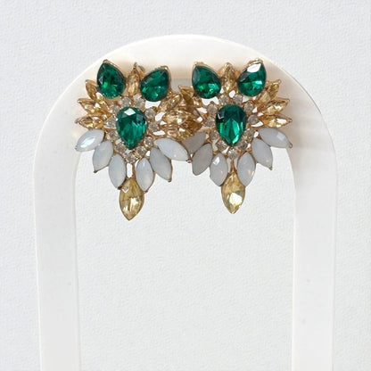 Elegantes pendientes tipo botón con diseño de noche de color esmeralda