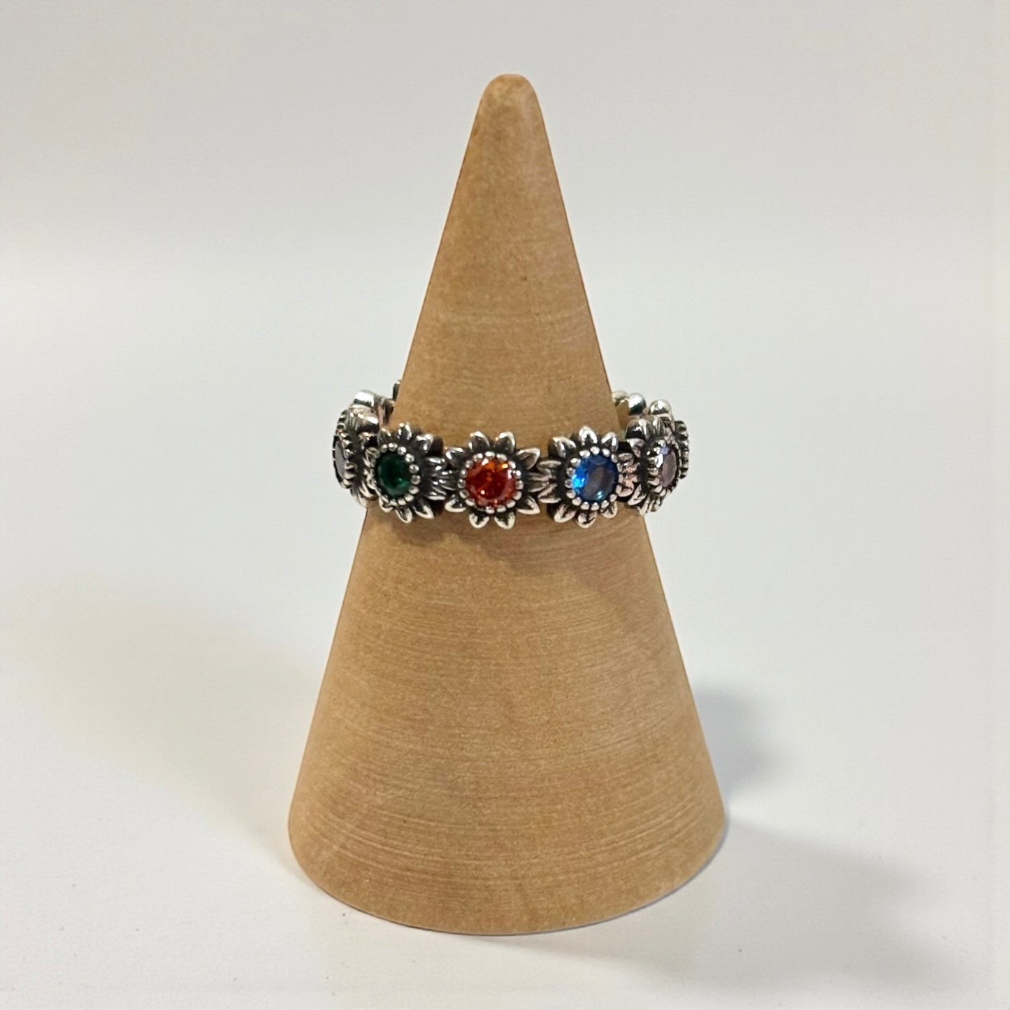 Anillo floral ajustable de colores