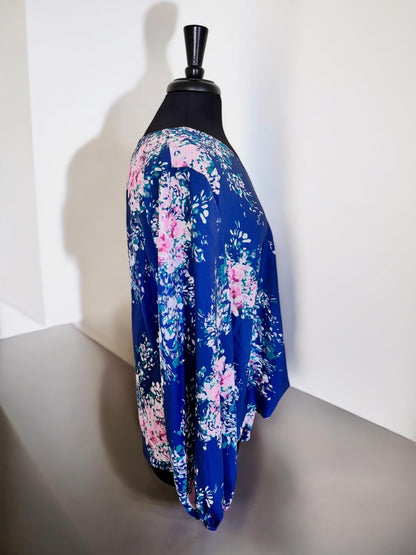 Blusa informal con cuello en V y lazo frontal con estampado floral para mujer