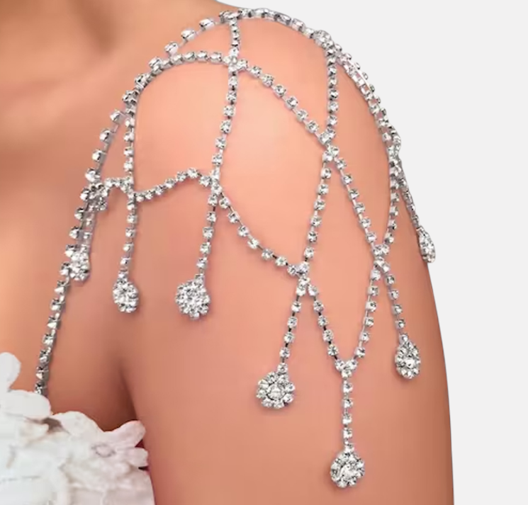 Omayra Boutique silver mesh shoulder chain adorned with sparkling rhinestones for an elegant evening look.