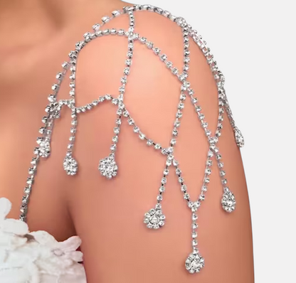 Omayra Boutique silver mesh shoulder chain adorned with sparkling rhinestones for an elegant evening look.