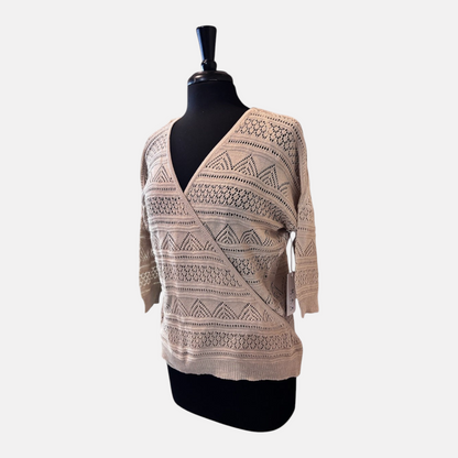 Omayra Boutique cream V-neck crossover wrap top in a textured knit cotton-acrylic blend with 3/4 sleeves.