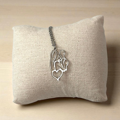 Mother Holding Baby Pendant Necklace