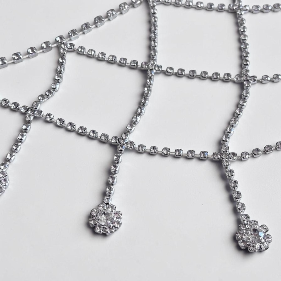 Omayra Boutique silver mesh shoulder chain with sparkling rhinestones and delicate floral accents