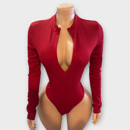 Body de mujer con cremallera en la espalda y manga larga