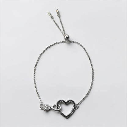Pulsera de plata con dije de corazón
