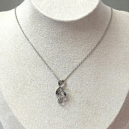 Collar de plata con nota musical