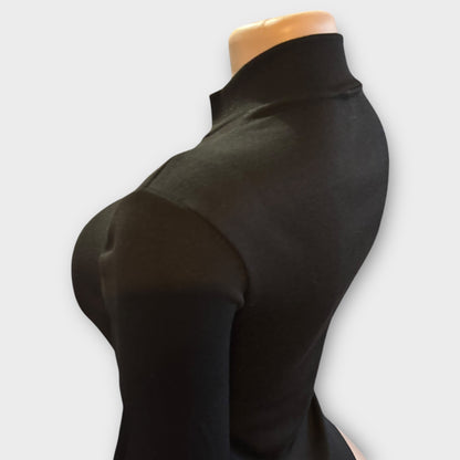 Body de mujer con cremallera en la espalda y manga larga