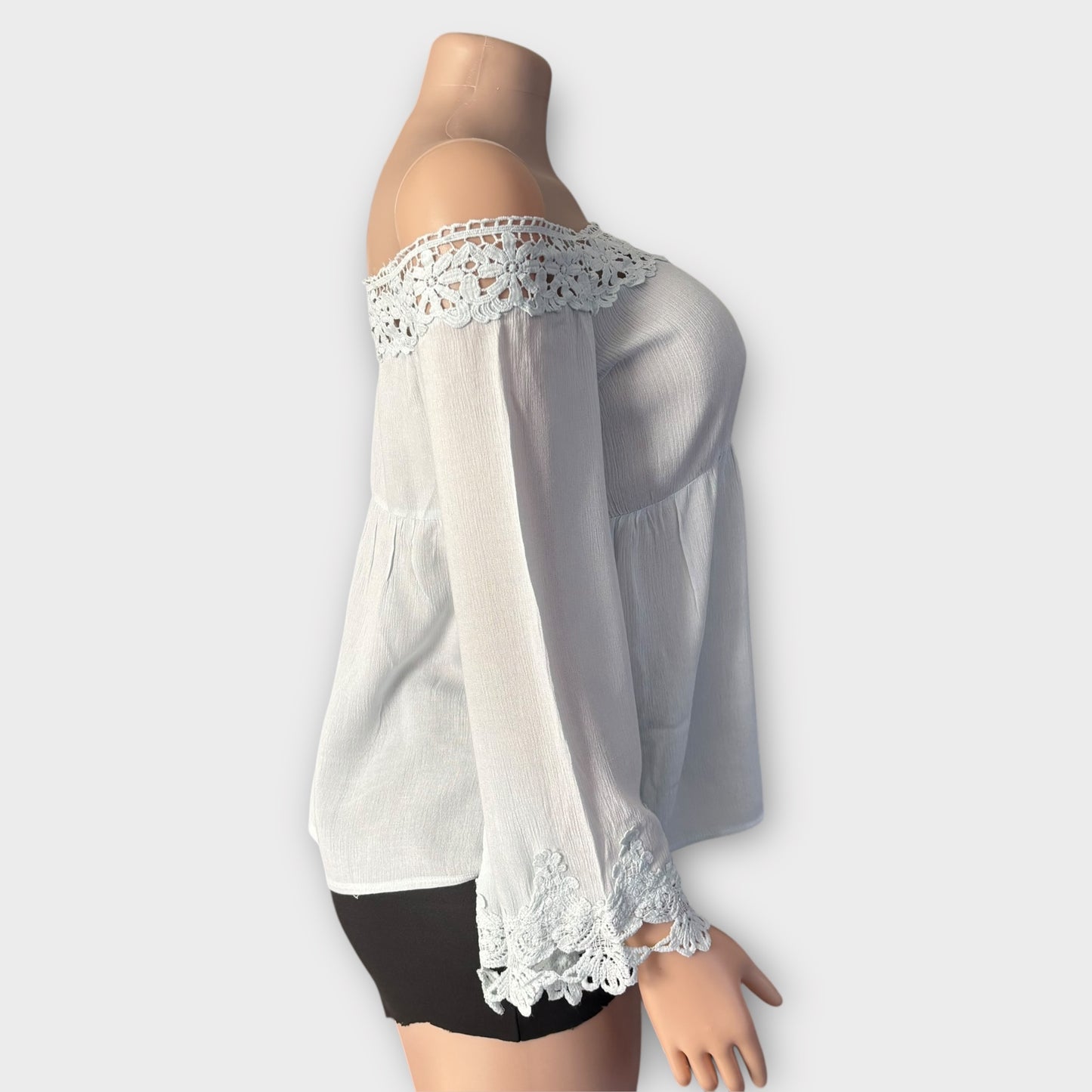 Blusa elegante de encaje azul claro para mujer