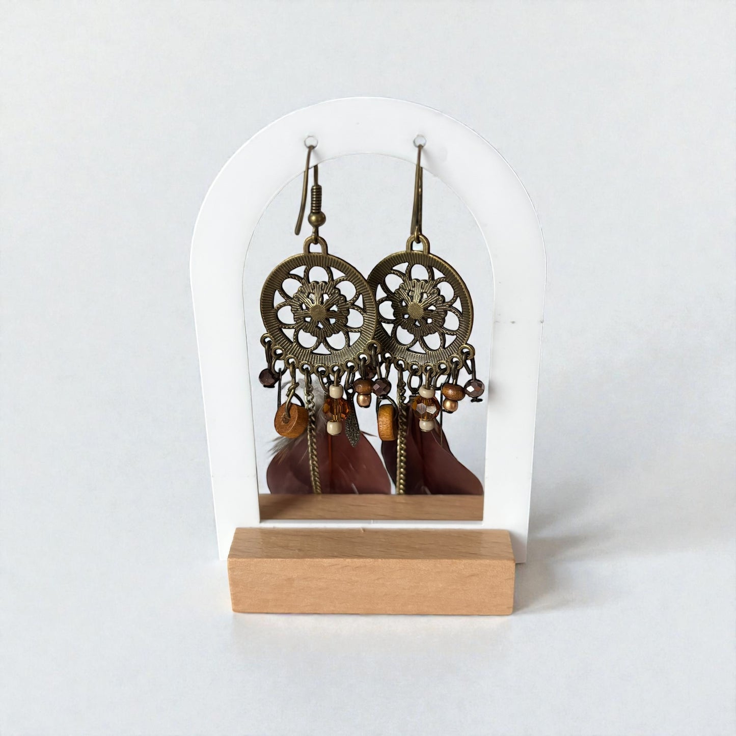 Pendientes largos con plumas