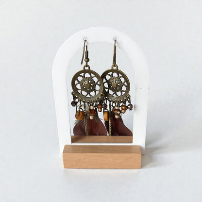 Pendientes largos con plumas