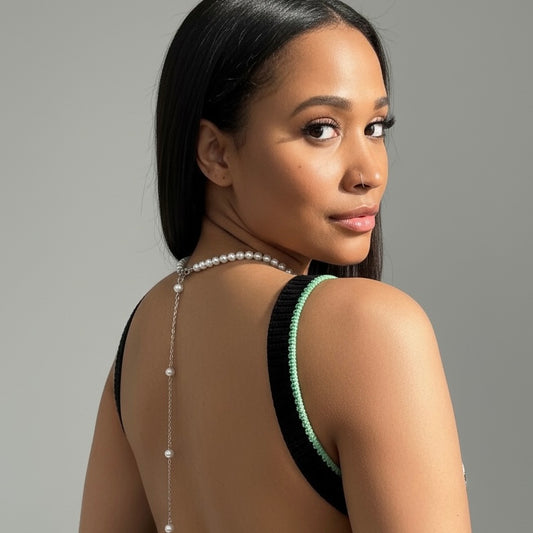 Cadena trasera con borla larga y perlas elegantes