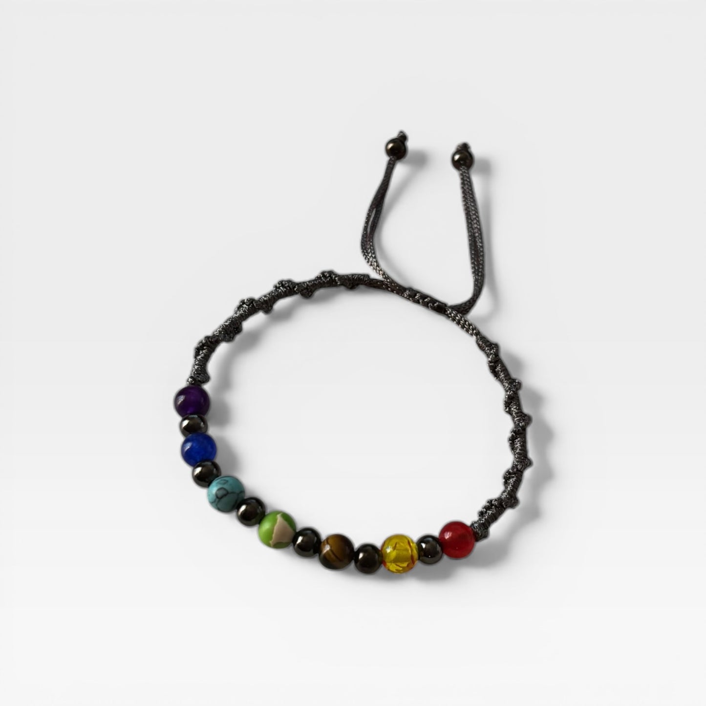 Pulsera trenzada de cuerda multicolor hecha a mano con cuentas de chakras