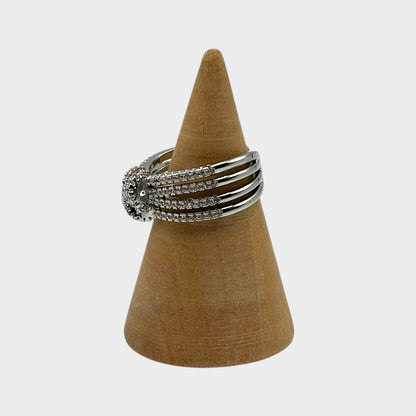 Anillo ajustable de circonitas con nudos cruzados