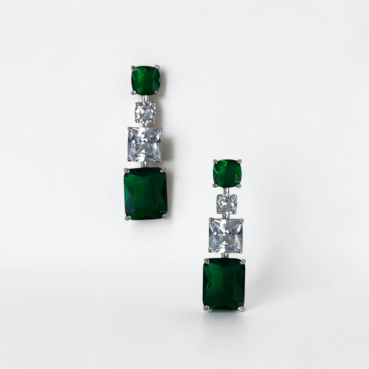 Omayra Boutique emerald green and silver drop earrings featuring square-cut stones in a lightweight copper setting.