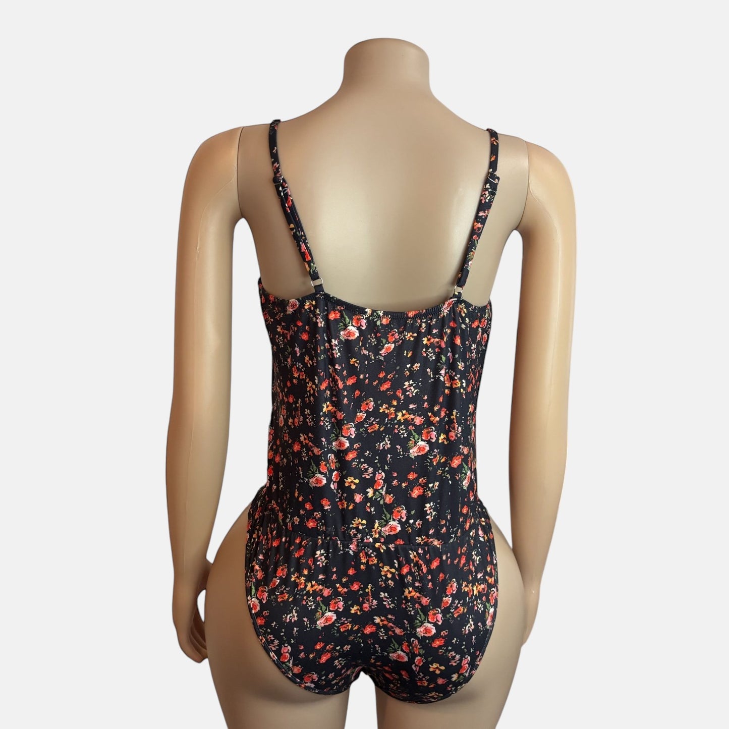Body de tirantes finos con estampado floral bohemio negro