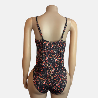 Body de tirantes finos con estampado floral bohemio negro