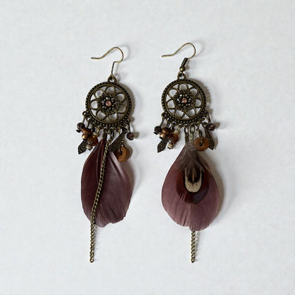 Pendientes largos con plumas