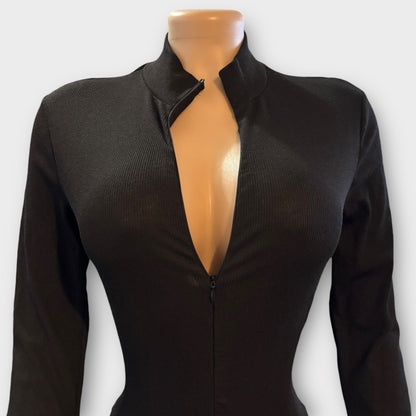 Body de mujer con cremallera en la espalda y manga larga