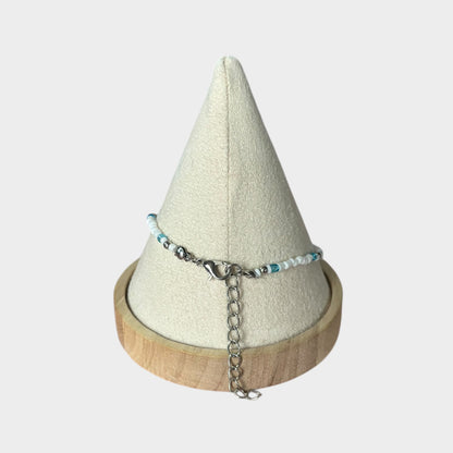 Pulsera bohemia de verano con estrellas de mar en el tobillo