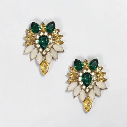Elegantes pendientes tipo botón con diseño de noche de color esmeralda