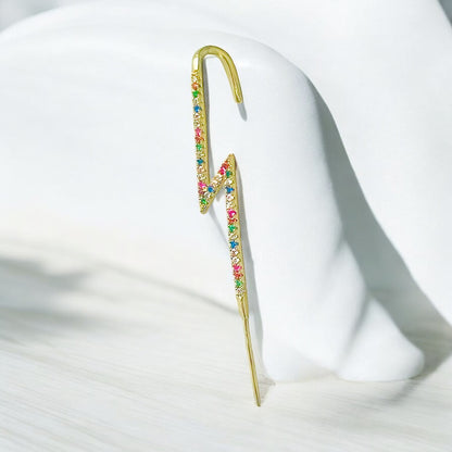 Pendientes largos únicos de una pieza con cristales de colores y accesorios dorados
