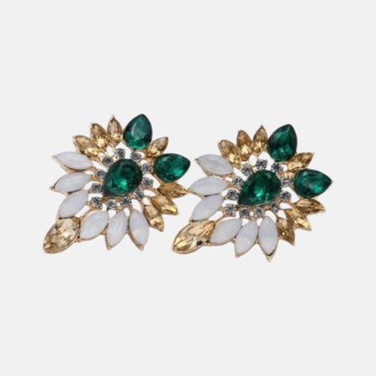 Elegantes pendientes tipo botón con diseño de noche de color esmeralda