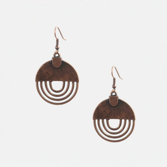 Omayra Boutique antique bronze dangle earrings with round cut-out design, 2 inches long, made of zinc alloy.