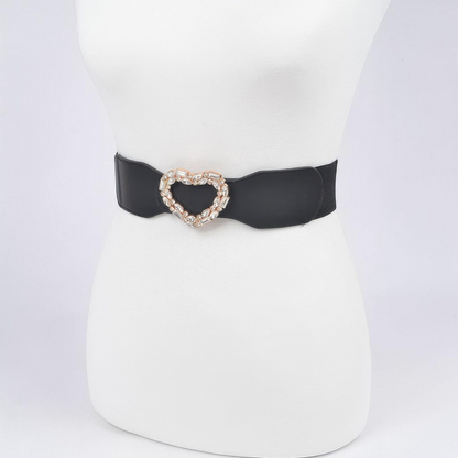 Omayra Boutique black elastic waist belt featuring a sparkling heart-shaped rhinestone buckle on a mannequin