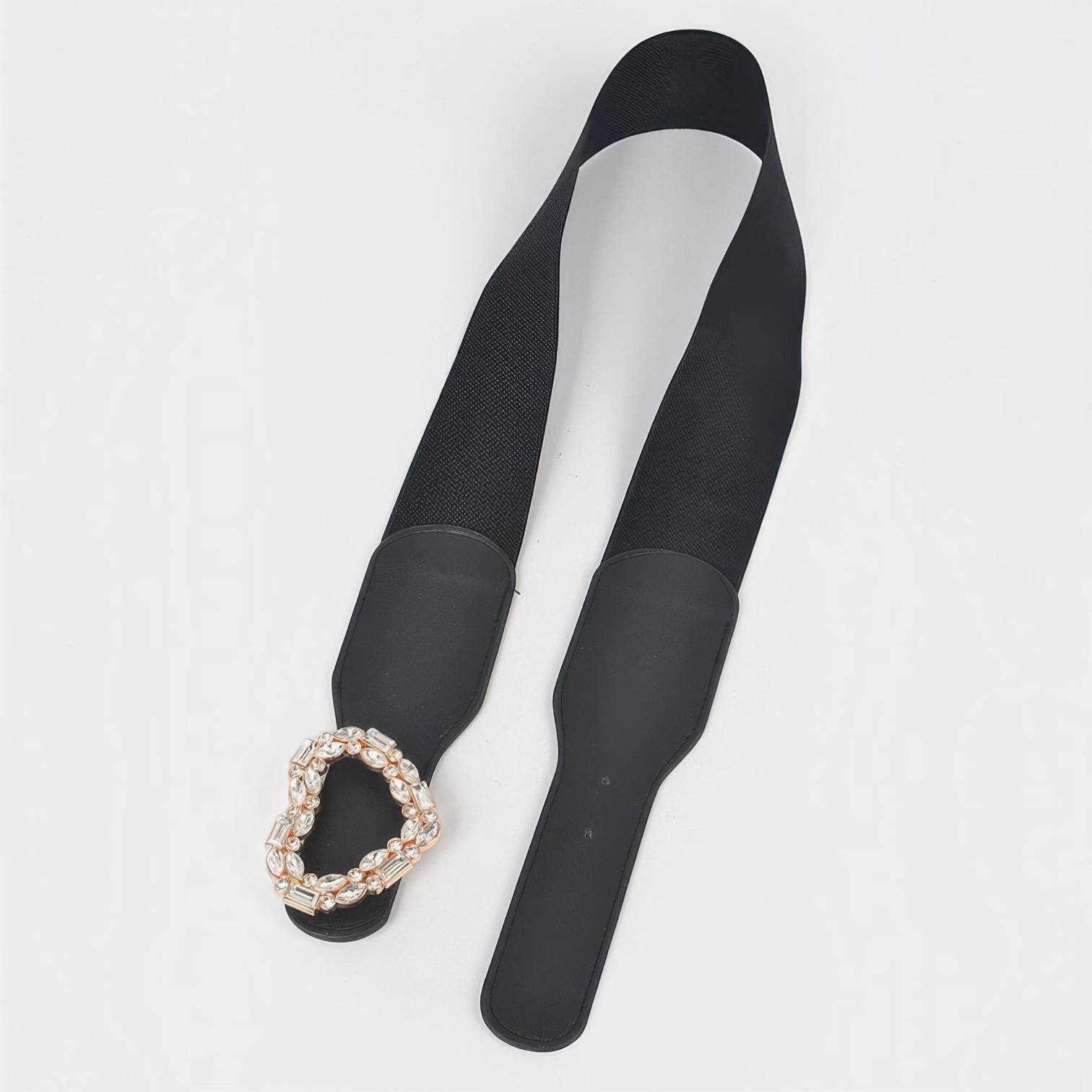 Omayra Boutique black elastic waist belt featuring a sparkling heart-shaped rhinestone buckle and faux leather ends.