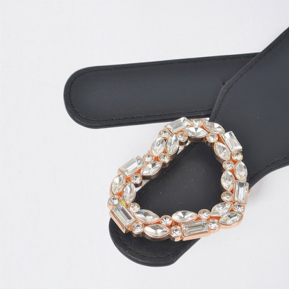 Omayra Boutique black elastic belt featuring a sparkling heart-shaped rhinestone buckle for a feminine look.