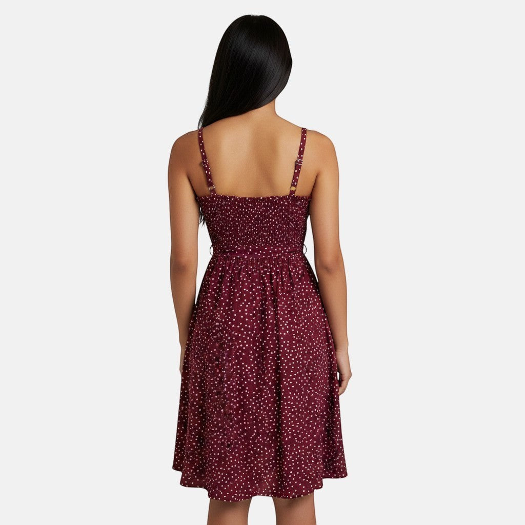 Omayra Boutique burgundy sundress with white polka dots, spaghetti straps, and a ruffled neckline.