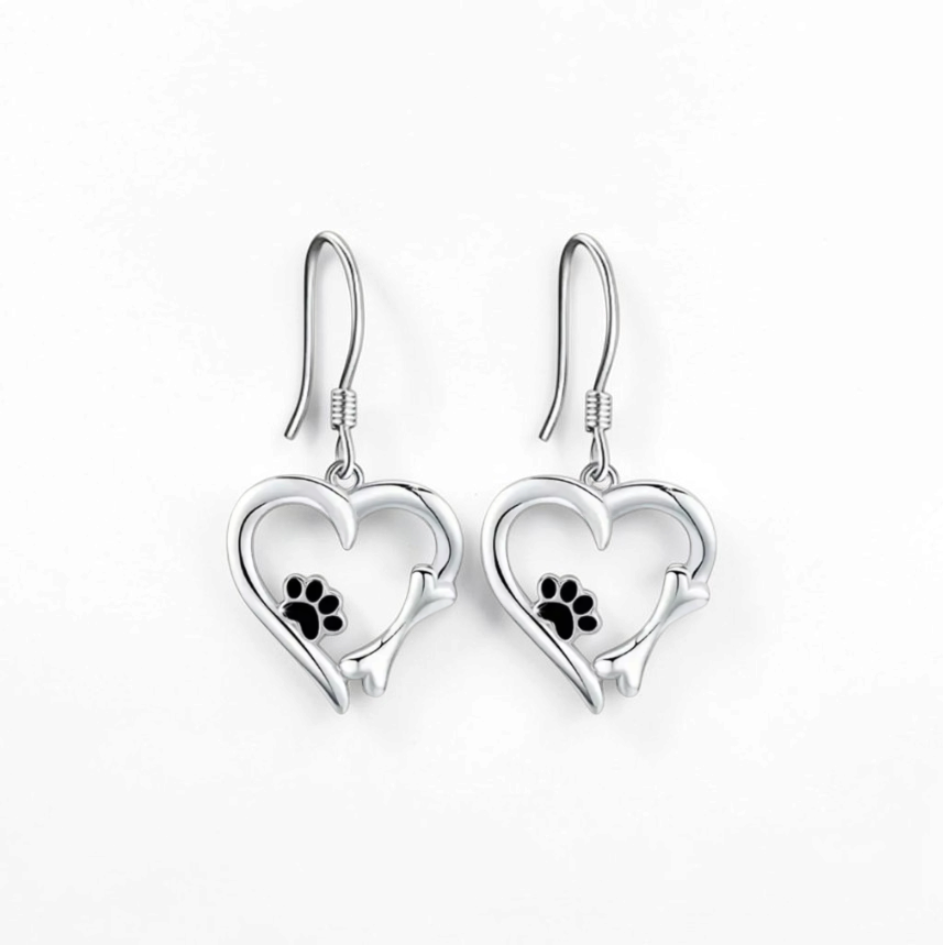 Omayra Boutique silver heart dangle earrings featuring a dog paw print and bone design in zinc alloy