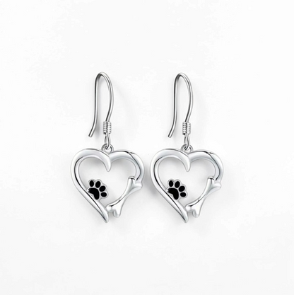 Omayra Boutique silver heart dangle earrings featuring a dog paw print and bone design in zinc alloy