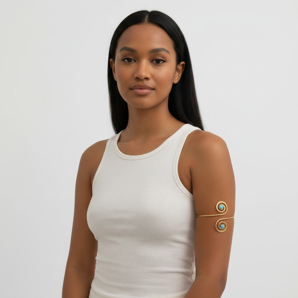 Omayra Boutique gold and turquoise spiral armband made of iron with boho style.