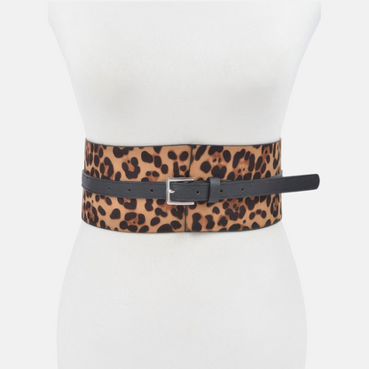 Omayra Boutique leopard print corset waist belt with a black strap and silver buckle on a mannequin torso