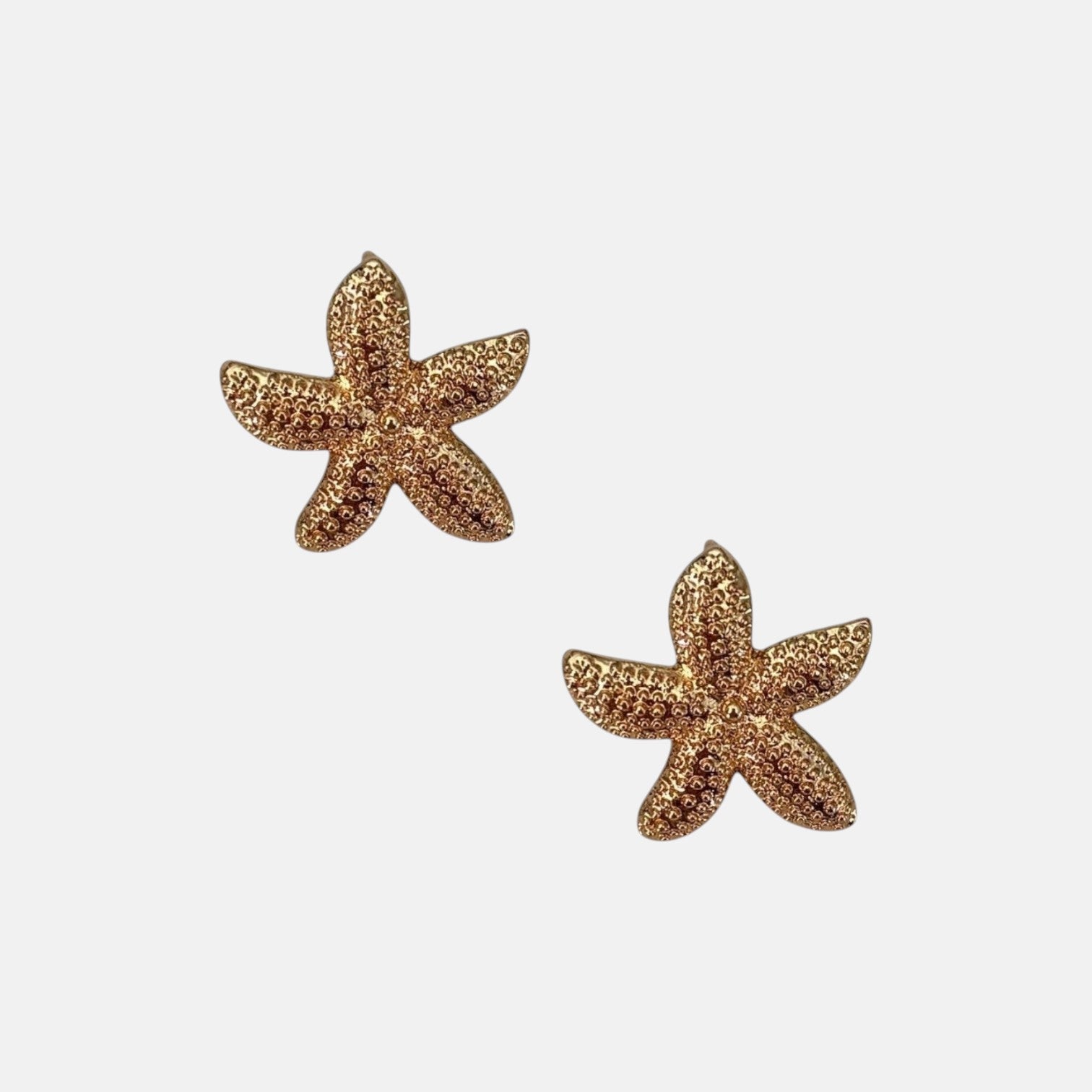 Omayra Boutique gold starfish stud earrings with textured surface, 1/2 inch, perfect for coastal charm.